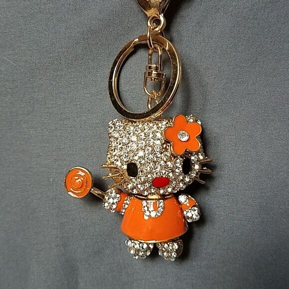 Hello Kitty Orange Lollipop Bejeweled Swivel Keychain - Picture 1 of 3